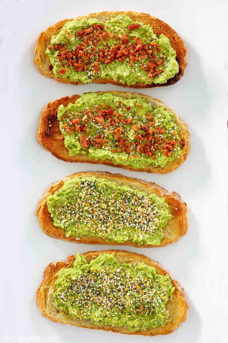 four homemade Dunkin Donuts avocado toast slices on a platter.