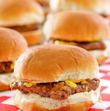 homemade Krystal burger on parchment paper.