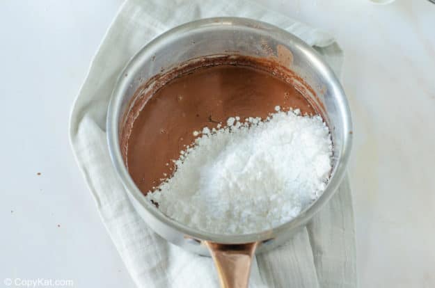 powdered sugar and chocolate mixture in a pan.