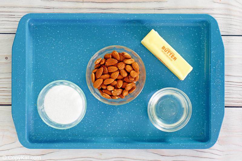 almond brittle ingredients on a tray.