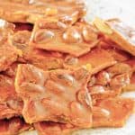homemade almond brittle candy on a plate.