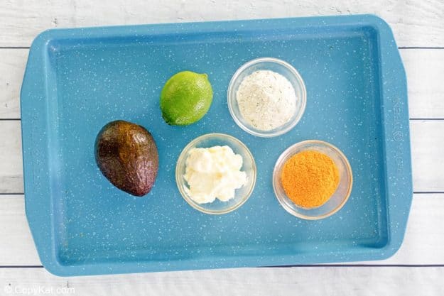 Chick Fil A avocado lime ranch dressing ingredients on a tray.