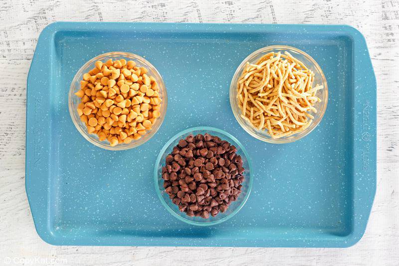 chocolate butterscotch haystacks ingredients on a tray.