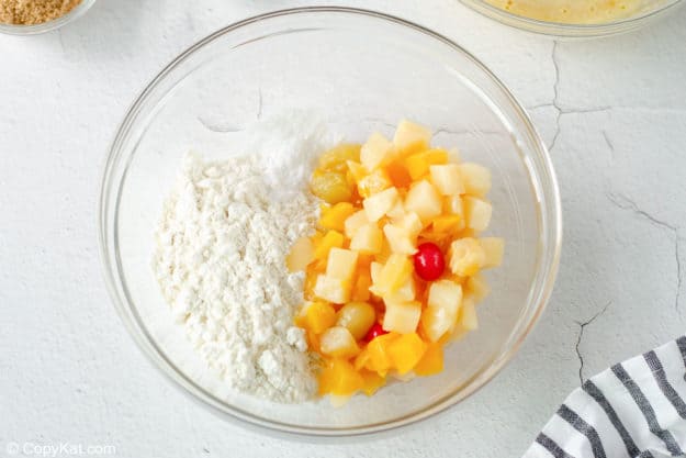 fruit cocktail, flour, baking soda, and salt in a bowl.