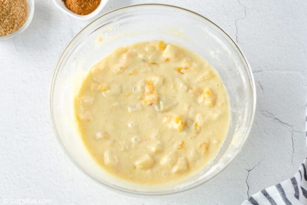 fruit cocktail cake batter in a mixing bowl.