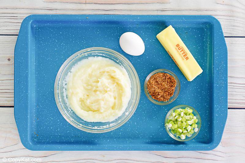 mashed potato pancakes ingredients on a tray.
