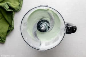 blended shamrock shake in a blender.