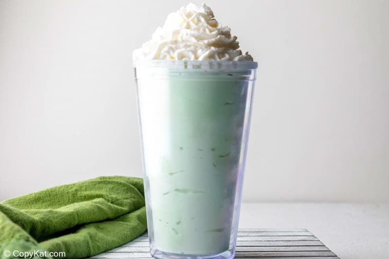 homemade McDonald's shamrock shake topped with whipped cream.