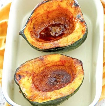 microwave acorn squash in a serving dish.