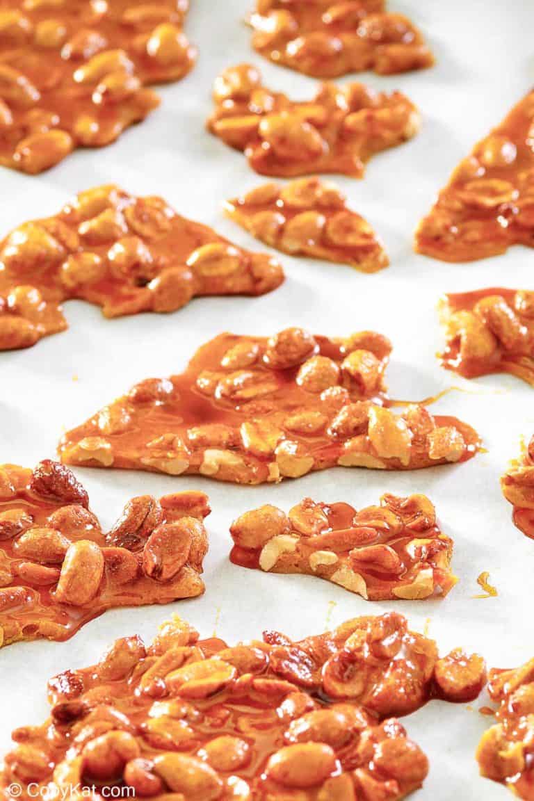 microwave peanut brittle pieces on parchment paper.