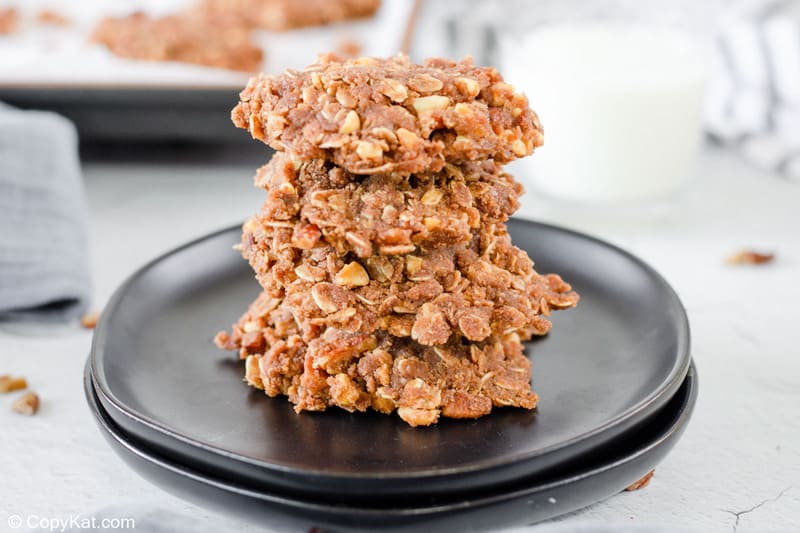 no bake chocolate oatmeal cookies in a stack on a plate.