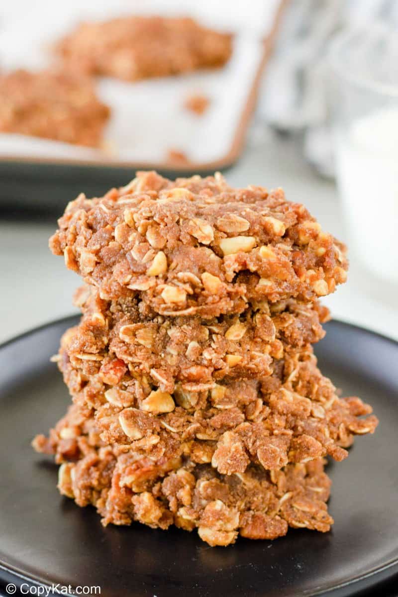 a stack of no bake chocolate oatmeal cookies on a plate.