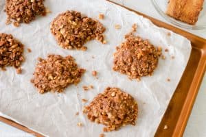 no bake chocolate oatmeal cookies on parchment paper.