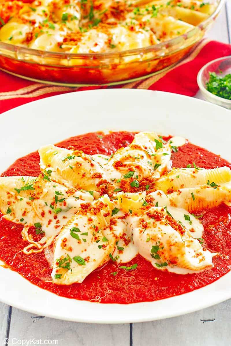 homemade Olive Garden giant cheese stuffed shells in a pasta bowl.