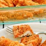 Ritz cracker chicken tenders on a plate and in a baking dish.