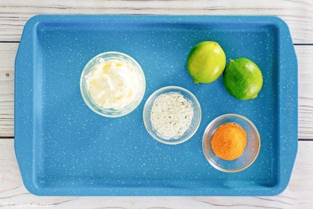 southwestern ranch dressing ingredients on a tray.