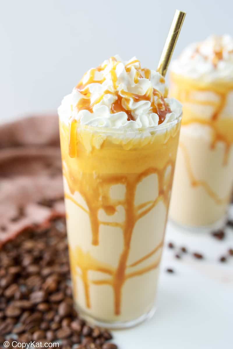 homemade Starbucks caramel frappuccino with whipped cream and caramel sauce.