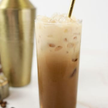 homemade Starbucks iced brown sugar oatmilk shaken espresso coffee drink in a glass.