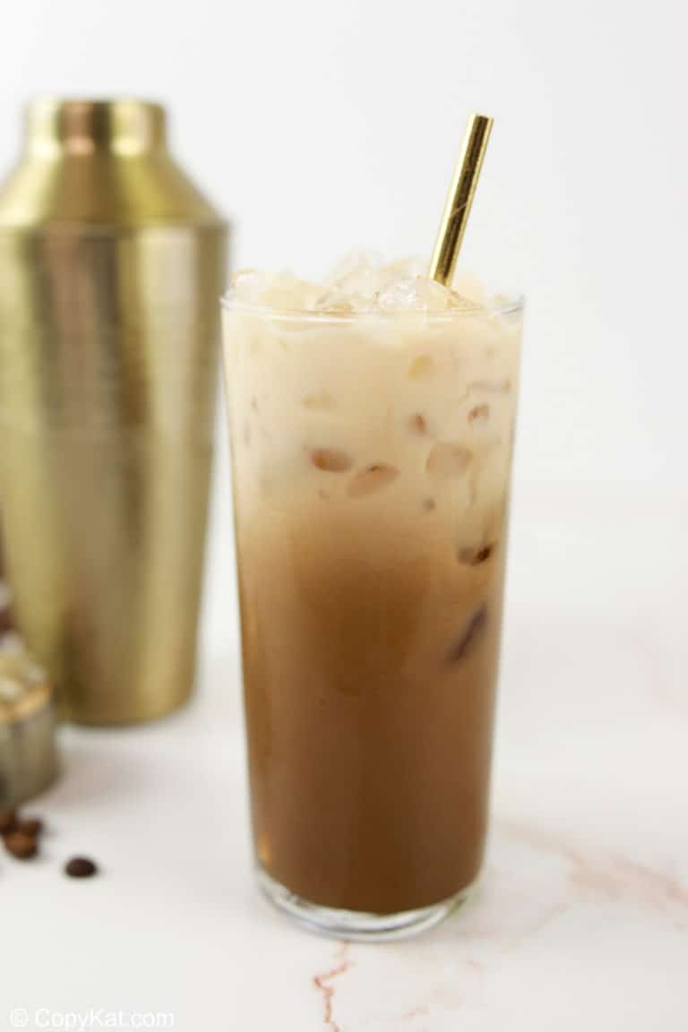 homemade Starbucks iced brown sugar oatmilk shaken espresso coffee drink in a glass.
