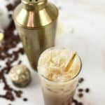 homemade Starbucks iced brown sugar oatmilk shaken espresso and a shaker.