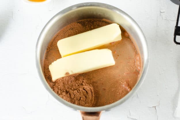 butter, cocoa powder, and water in a saucepan.