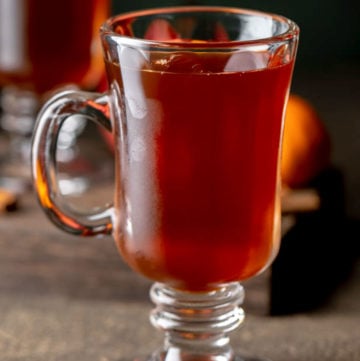 wassail in a glass mug.