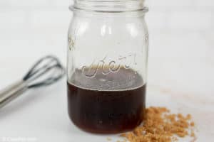 brown sugar simple syrup in a glass jar.