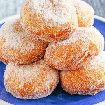 homemade Chinese donuts on a blue plate.