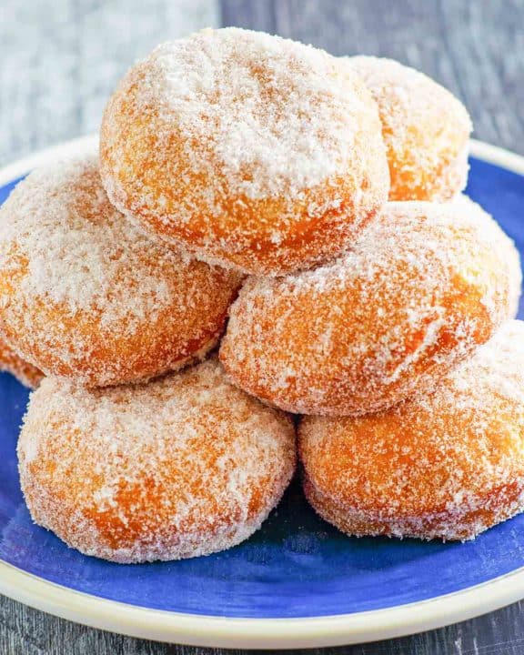 homemade Chinese donuts on a blue plate.