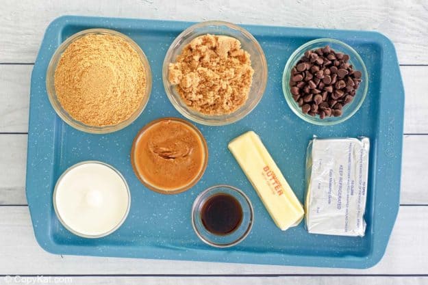 chocolate peanut butter pie ingredients on a tray.