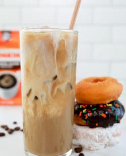 homemade Dunkin Donuts iced coffee with milk and donuts.