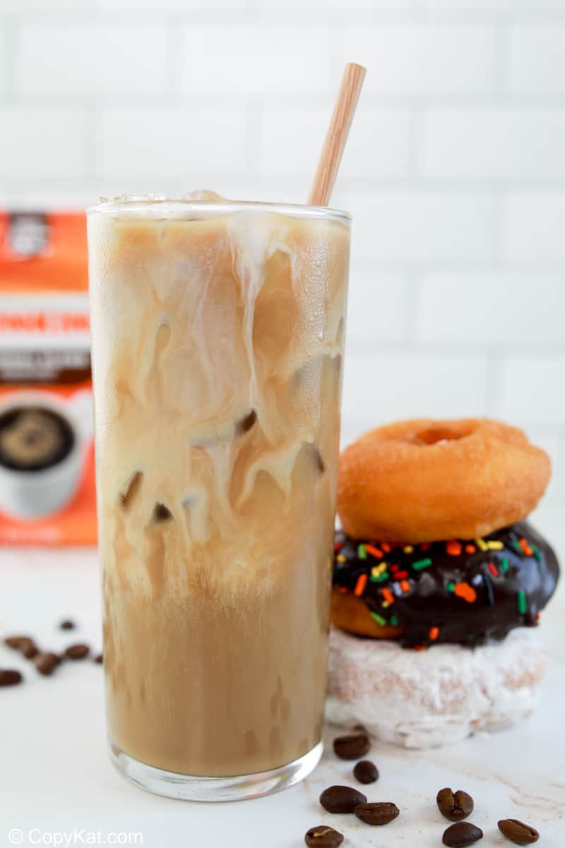 homemade Dunkin Donuts iced coffee with milk and donuts.