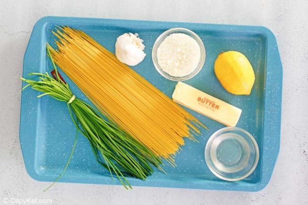 garlic butter pasta ingredients on a tray.