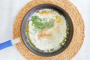 garlic butter pasta sauce in a pan.