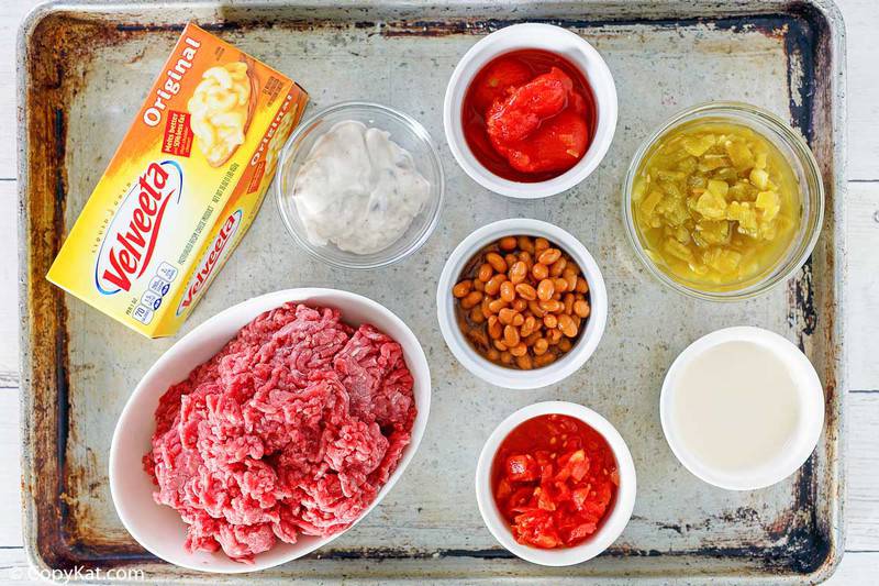 hamburger dip ingredients on a baking sheet.