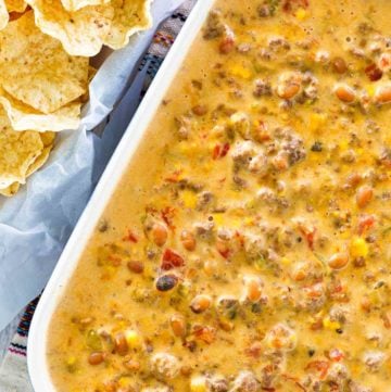 overhead view of hamburger dip and tortilla chips.