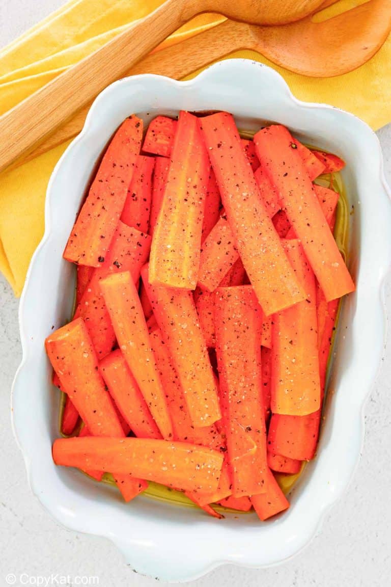 overhead view of honey roasted carrots in a serving dish.