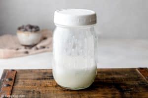 shaken frothed hot milk in a jar.