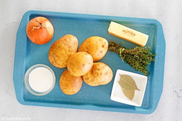yukon gold mashed potatoes ingredients on a tray.