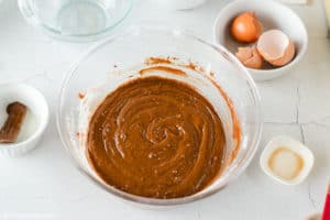 chocolate crinkle cookies dough in a mixing bowl.