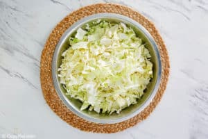 chopped cabbage in a bowl.