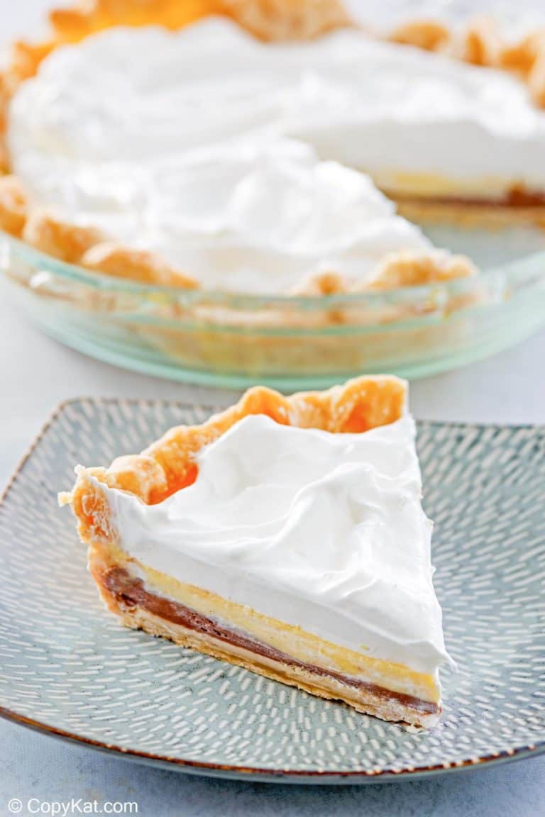 black bottom pie slice on a plate in front of the pie.