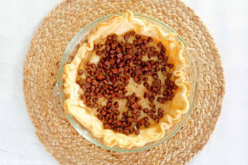 chocolate chips in a baked pastry pie shell.