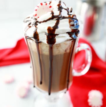 homemade McDonald's Peppermint mocha topped with whipped cream and chocolate syrup.