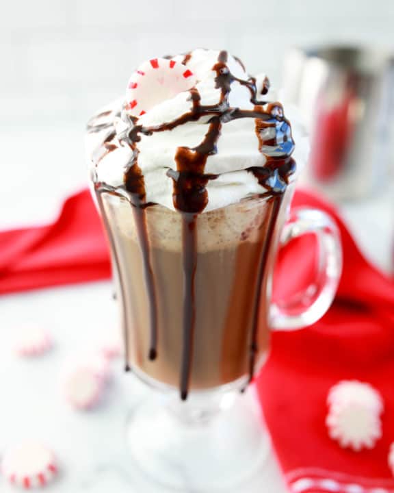 homemade McDonald's Peppermint mocha topped with whipped cream and chocolate syrup.