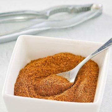 homemade old bay seasoning in a small square bowl.