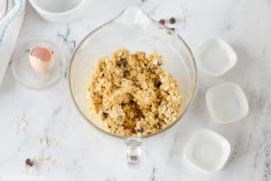 oatmeal raisin cookie dough in a mixing bowl.