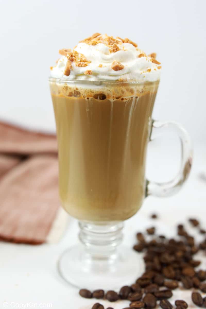 homemade Starbucks smoked butterscotch latte in a glass coffee mug.