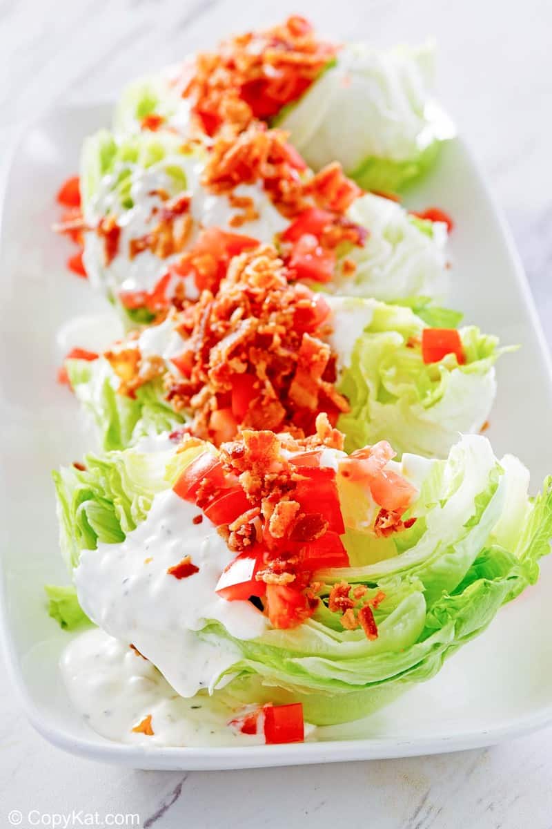classic wedge salad on a platter.