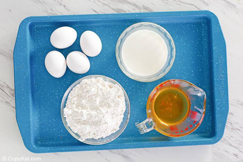 Yorkshire pudding ingredients on a tray.